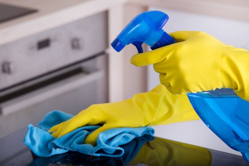 Cleaner working through a Collierswood flat during a move out cleaning service
